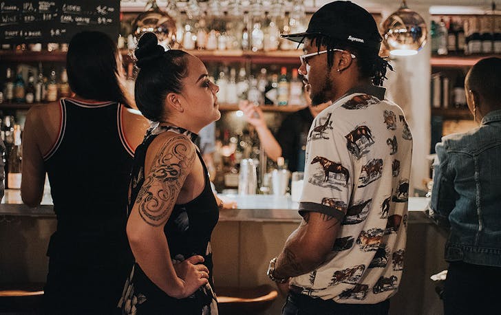Girl and boy at the bar, Best Auckland bars for awkward first dates