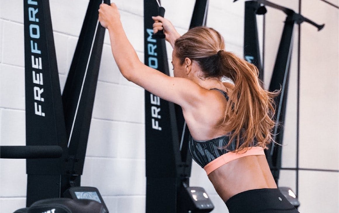 Person using a machine at Fitstop Melville.