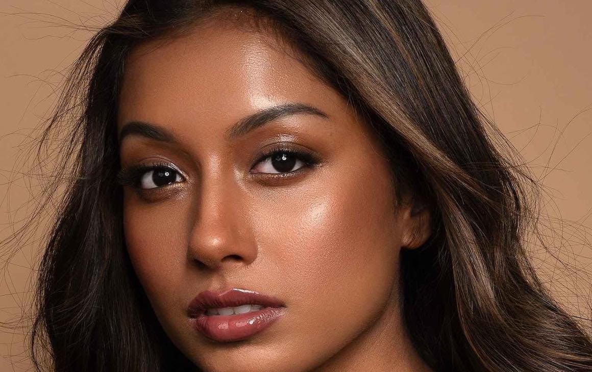 a woman of colour with beautiful makeup