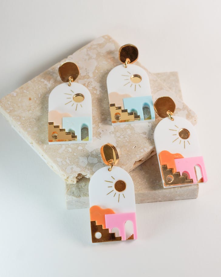 two sets of colourful earrings