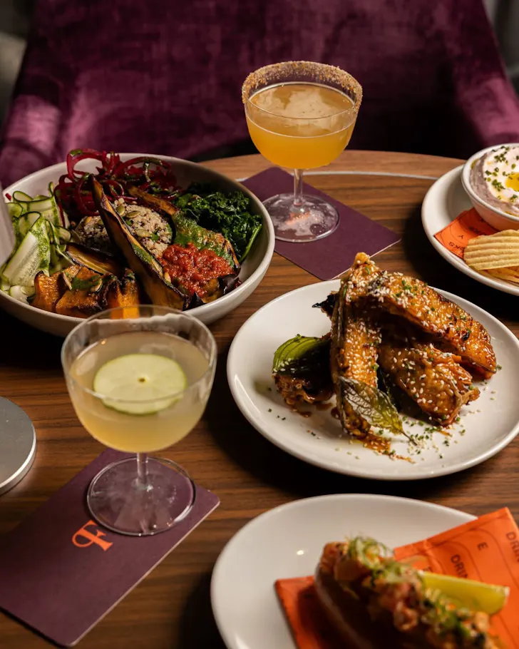 A selection of menu items and drinks at Folio in Walsh Bay