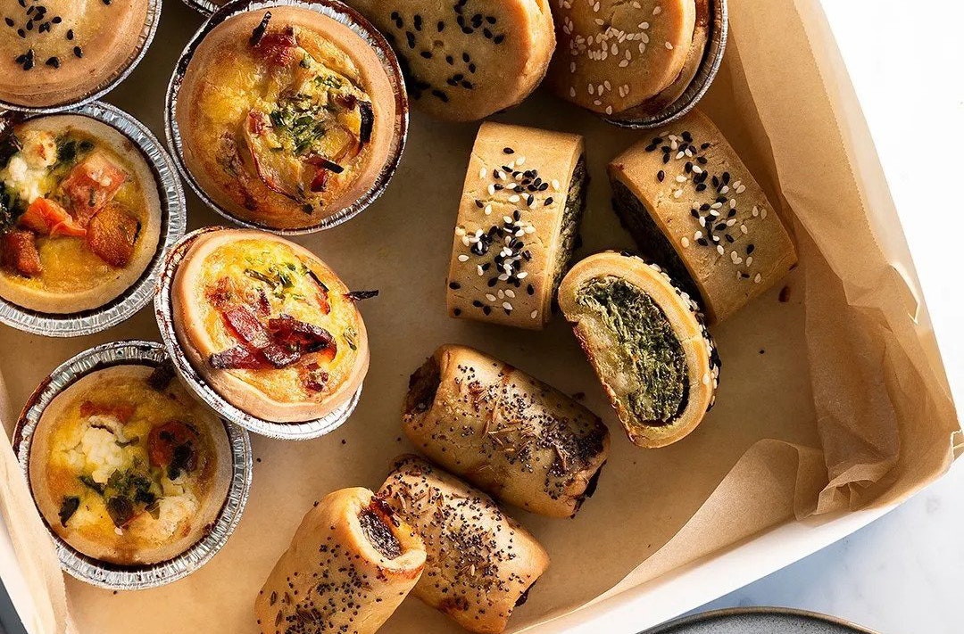 A tray of gluten-free pies and pastries. 