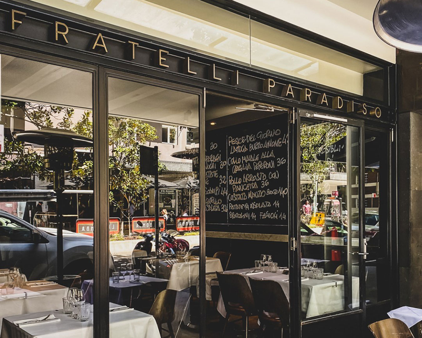 exterior of restaurant with 'Fratelli Paradiso' sign