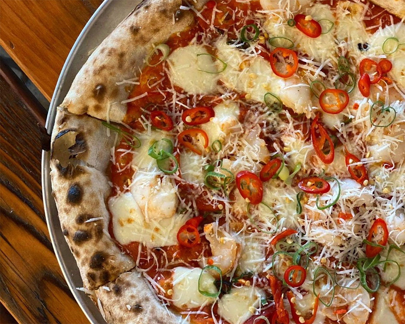 A delicious Chilli Prawn Pizza fresh from the pizza oven at The Freeport, one of the best restaurants in Tauranga and the mount.