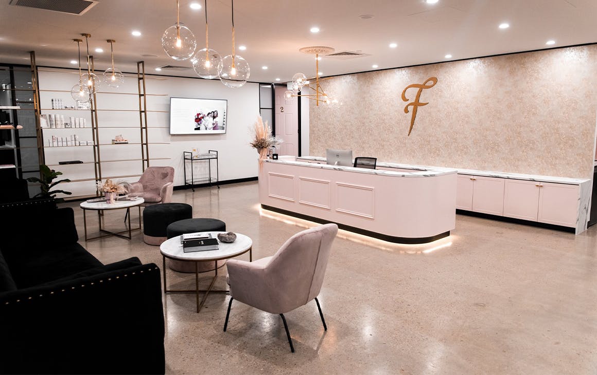 a pink beauty clinic reception