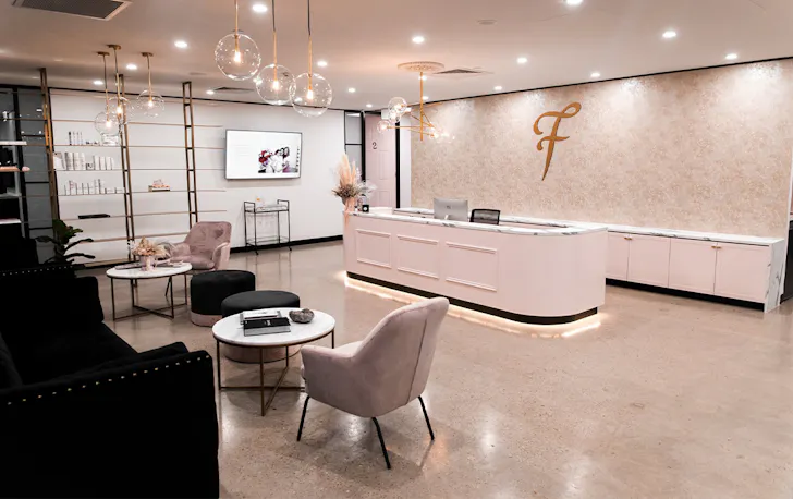 a pink beauty clinic reception
