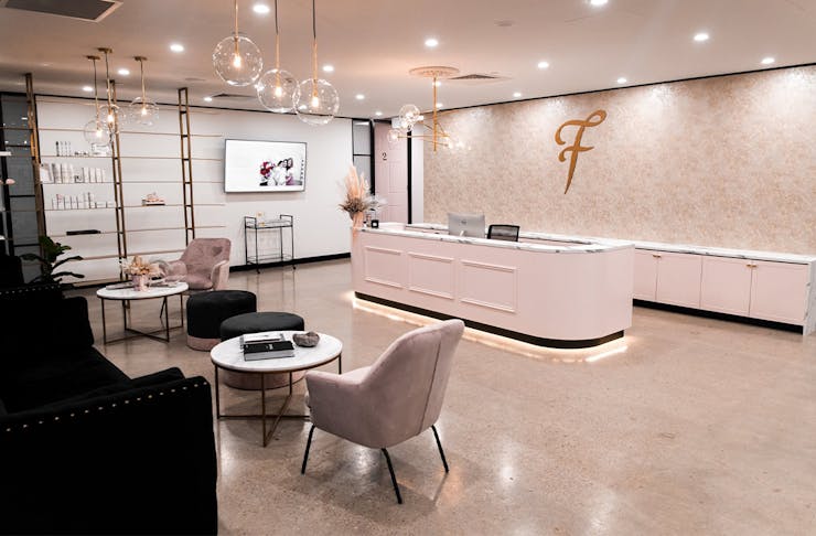 a pink beauty clinic reception