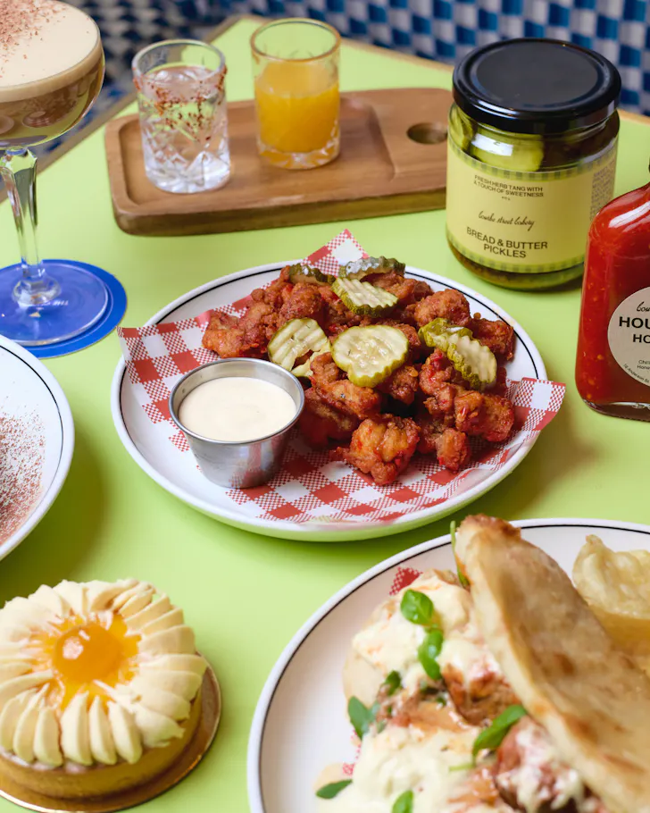 An array of food and drinks specials featured for Friends Of The Clock