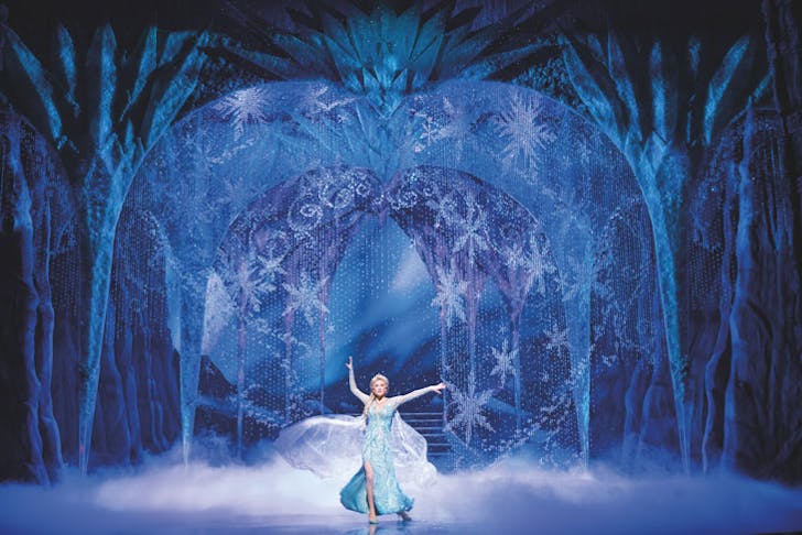 A scene from Frozen the Musical, showing Elsa in the ice castle. 