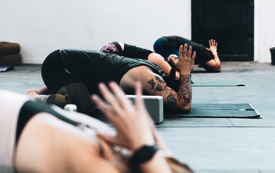 several people in yoga poses