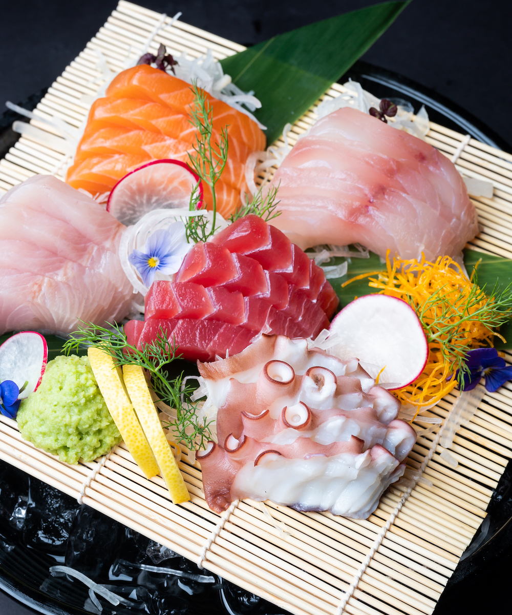 a plate of sashimi