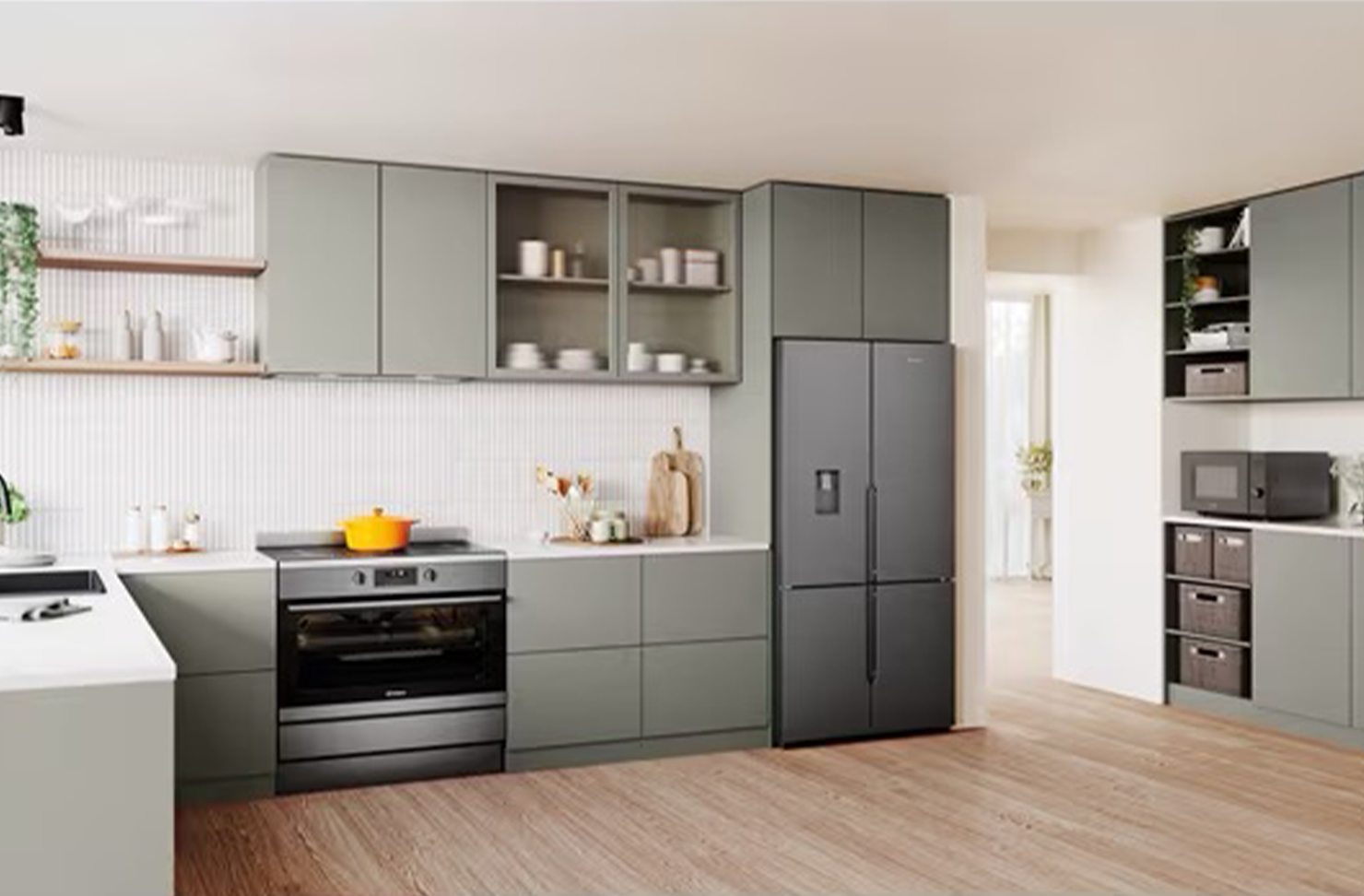 Matte green kitchen with fridge and stove