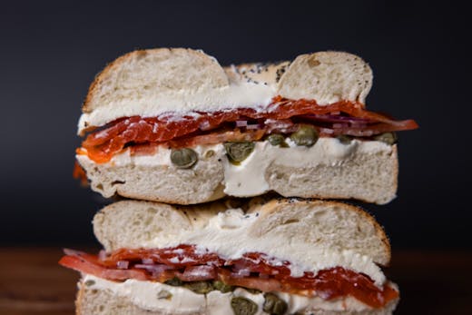 A lox bagel, sliced in half from George Street Deli.