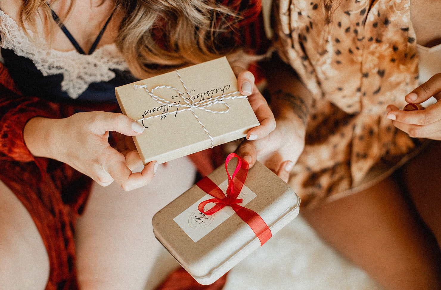 Two friends exchange gifts.