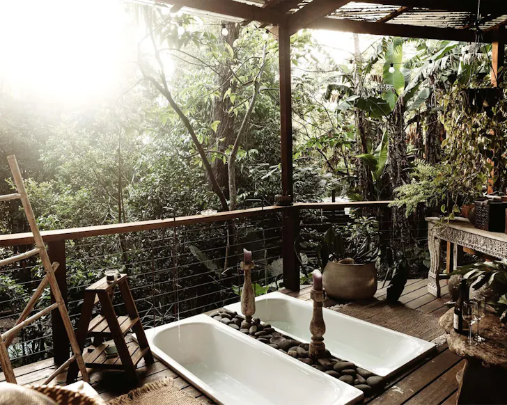 A view of the twin outdoor baths on the deck at Dome In Clunes Airbnb near Brisbane Queensland