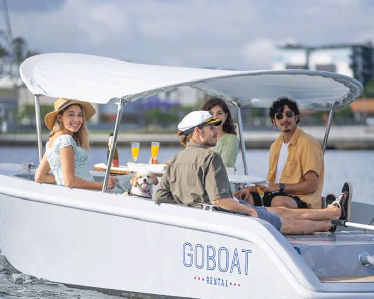Four people on a boat