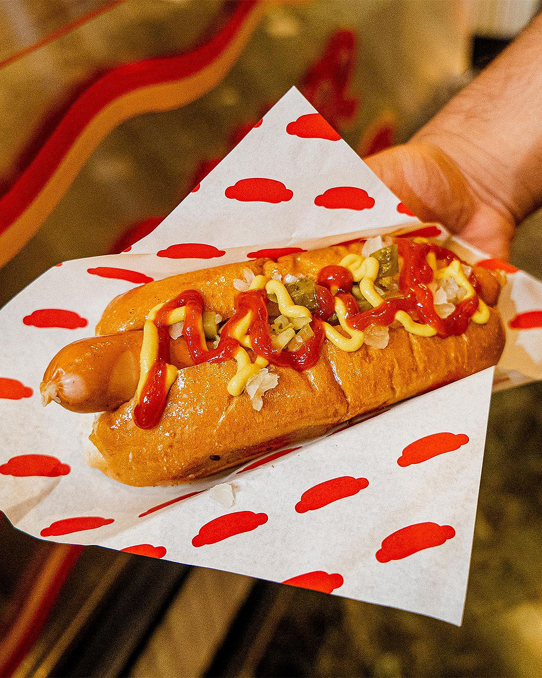 A seriously stacked hot dog, one of the best places in Auckland to score a cheap eat.