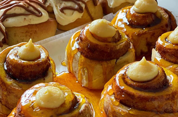 A row of sticky cinnamon buns from Got Baked Good.