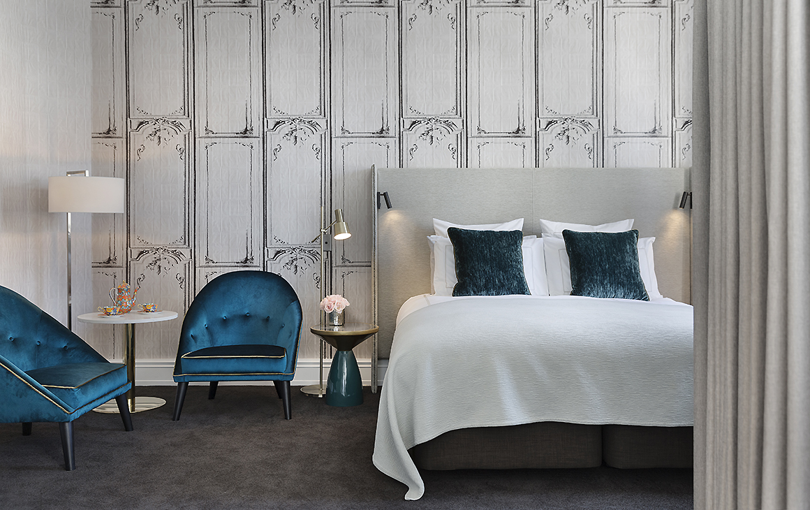 A gorgeous looking room at the Fable Auckland with plush furnishings and stylish decor.