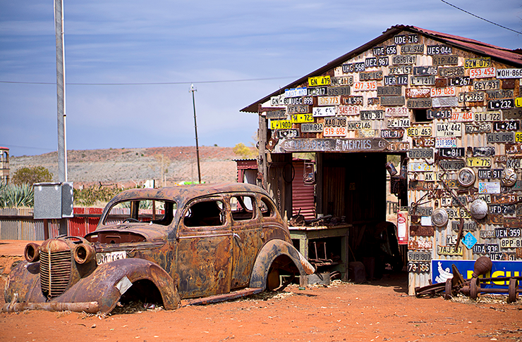 A derelict car in the empty streets of Gwalia, Western Australia.