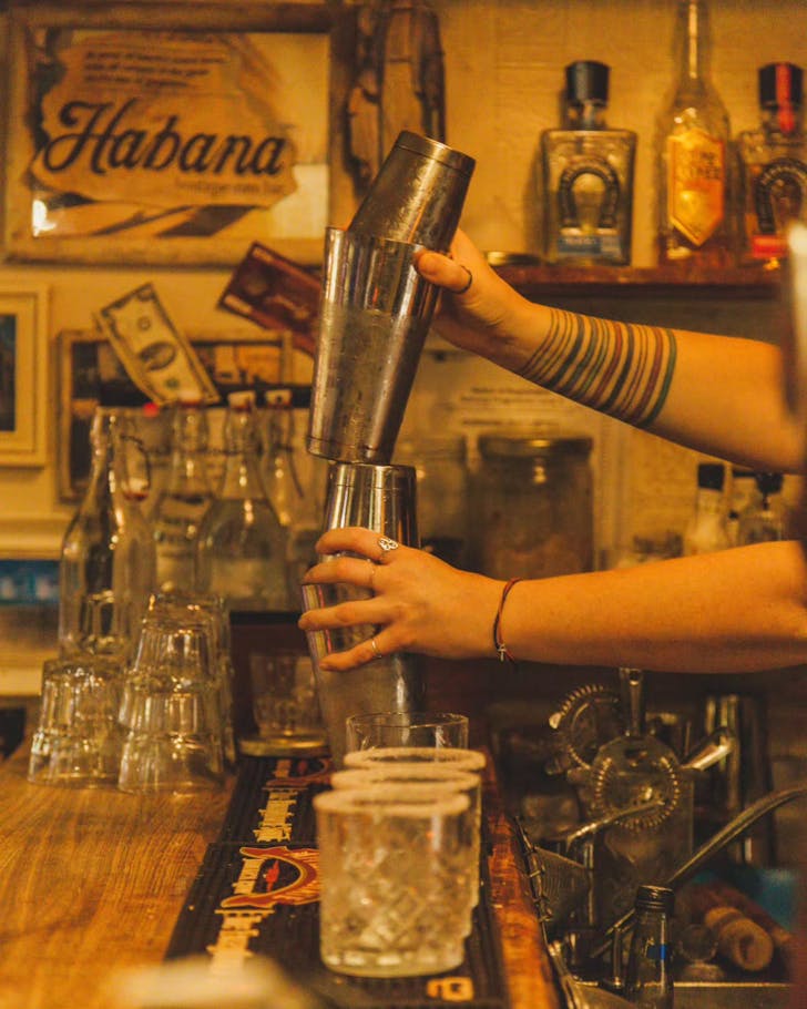 Cocktail shakers at Habana Bar