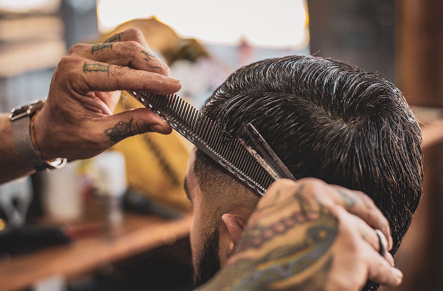 A man gets his hair cut