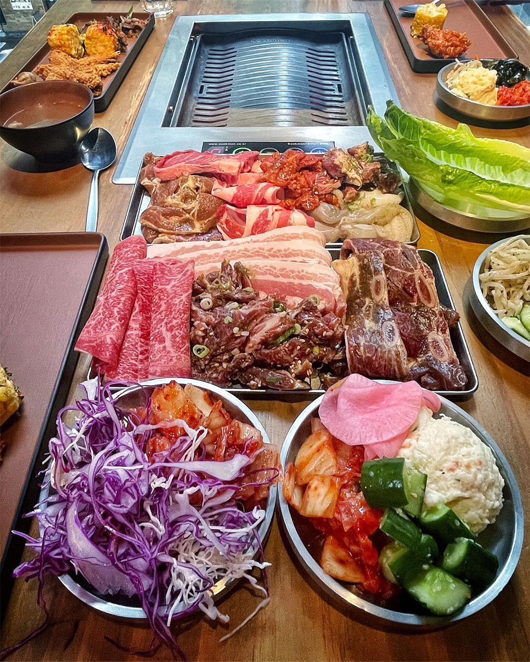 a table of bbq meats at brisbane korean bbq spot hanwoori