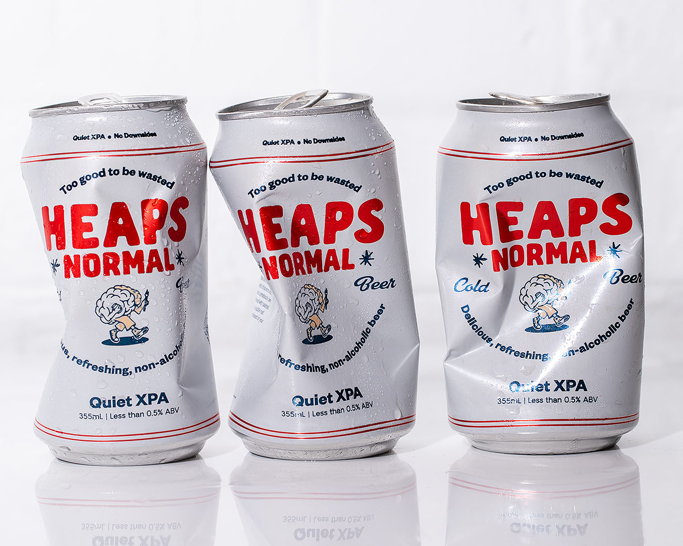 Three crumpled heaps normal cans on a white background.