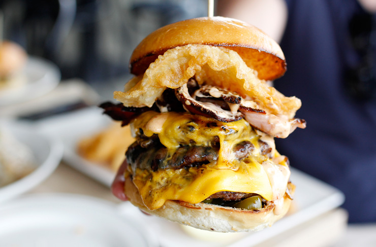A massively cheesy and stacked burger with one of the best potato cakes in Melbourne.