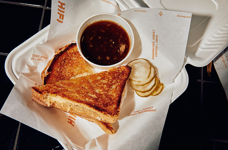 A golden, crunchy toastie with a cup of coffee—one of the best breakfasts in Melbourne