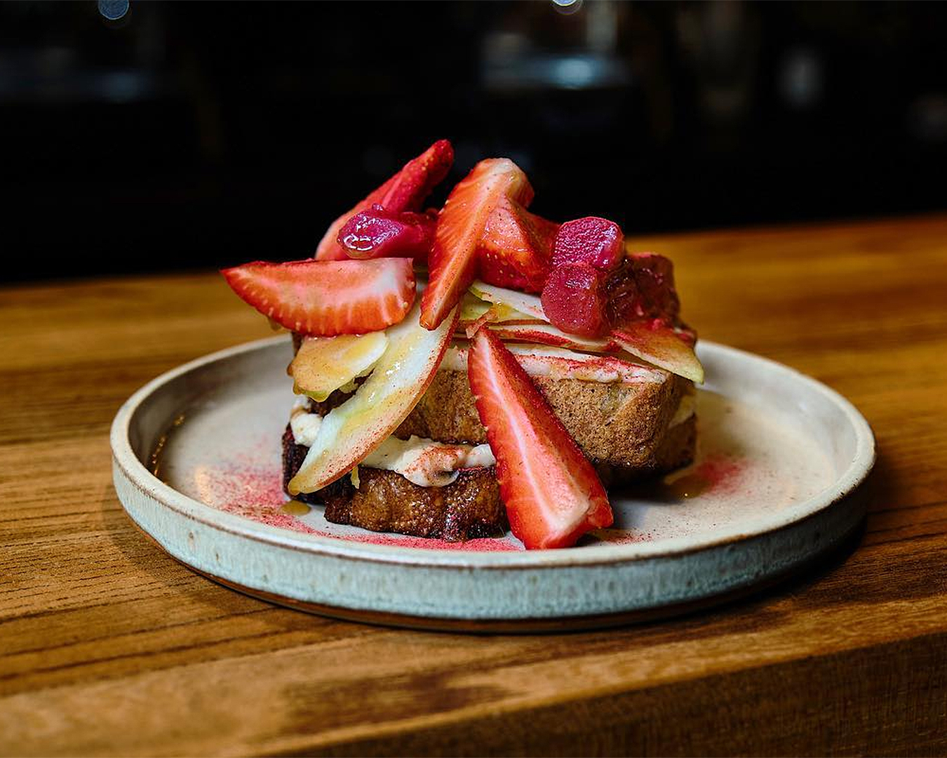 Fruit Toast whipped spiced ricotta, apple, rose poached rhubarb, strawberries, honey