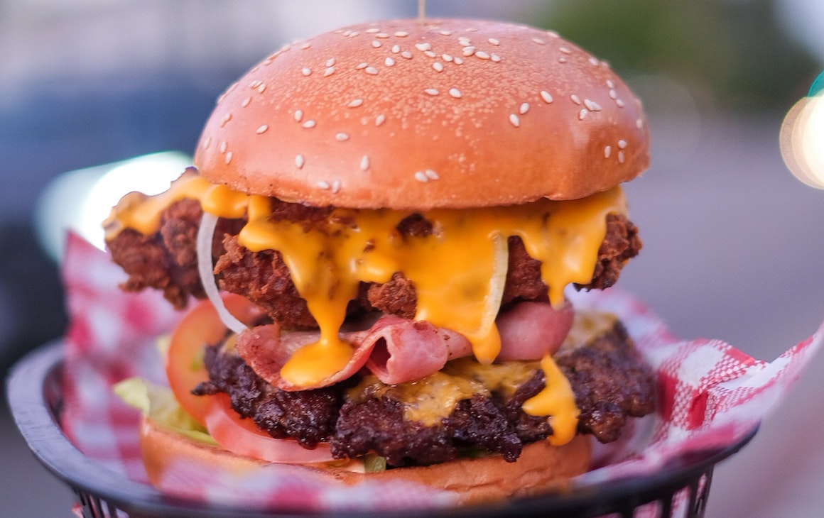 a cheese loaded burger