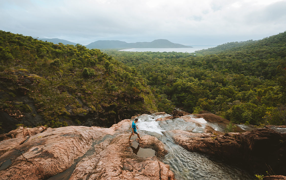 views from the top of a waterfall over Queensland's hinchinbrook island