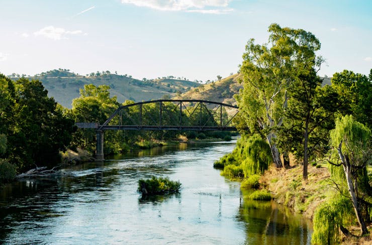 An old bridge over a country river. 