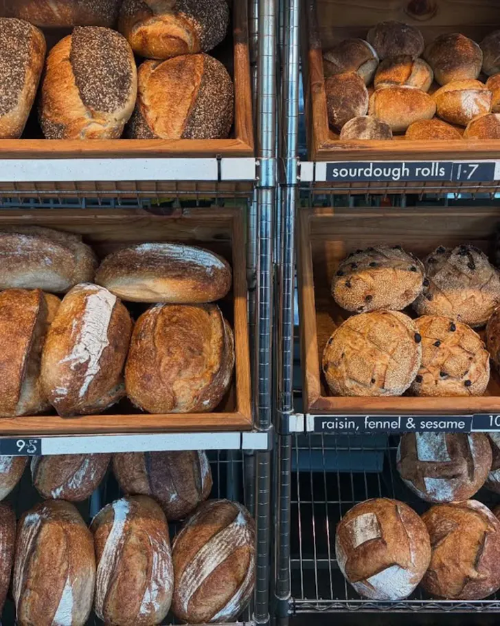 Loaves of bread line the shelves at Honorbread in Narooma.