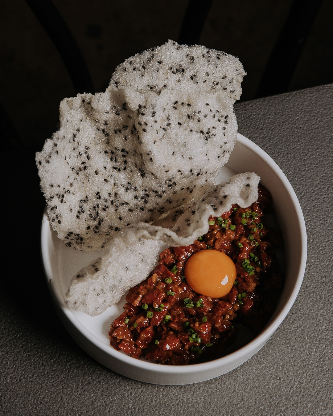 a plate of beef tartare at brisbane restaurant honto