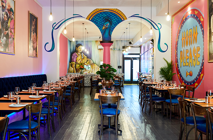 The colourful interior of Indian restaurant Horn Please.