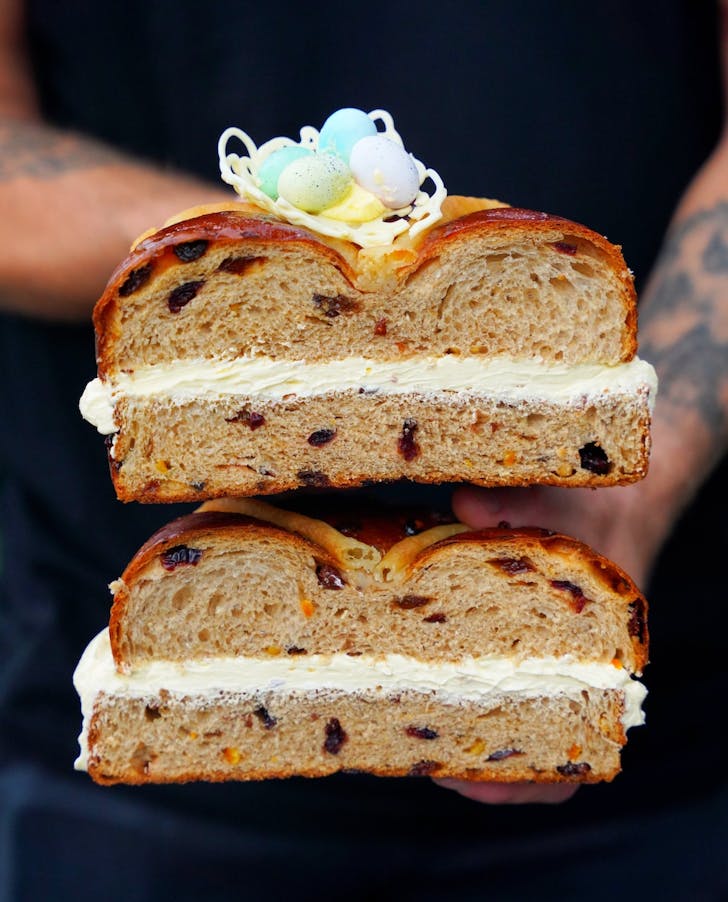 a massive hot cross bun filled with cream from sydney bakery tuga pastries