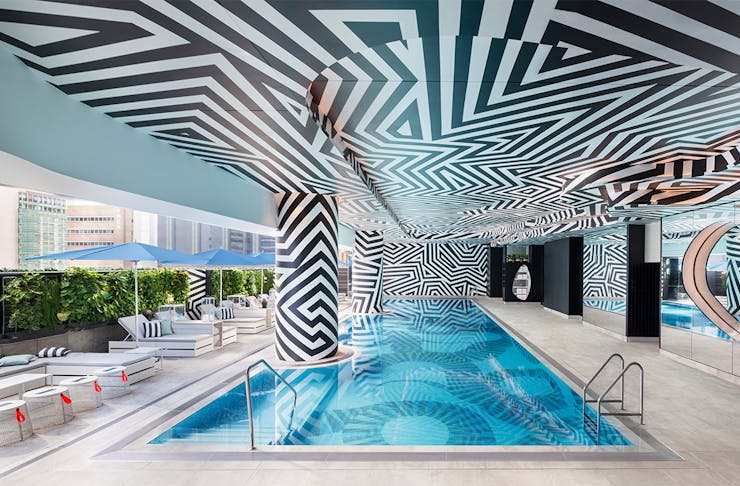 w Brisbane's undercover pool, with a roof covered in zig zagging black lines