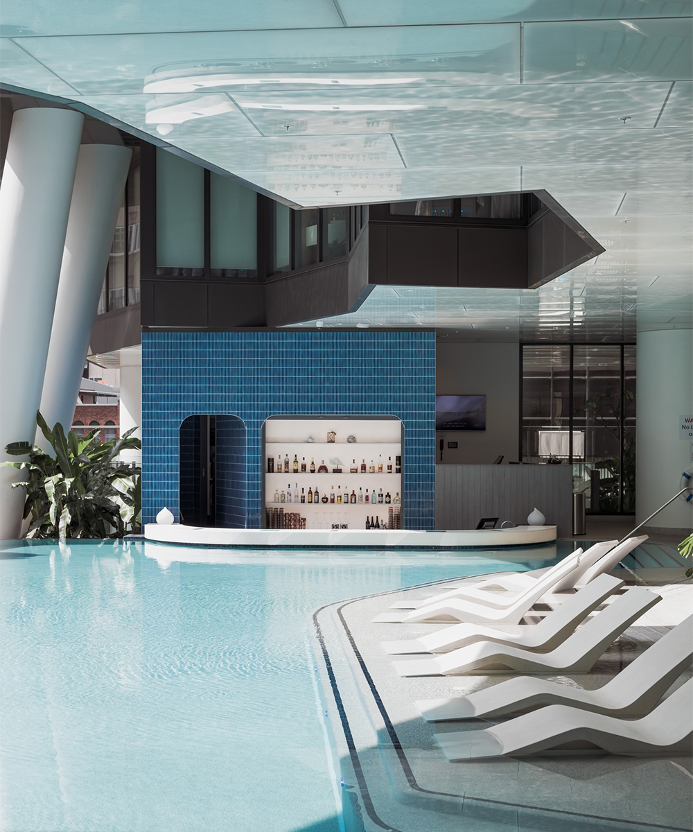 a pool with a swim up bar at Westin Hotel Brisbane