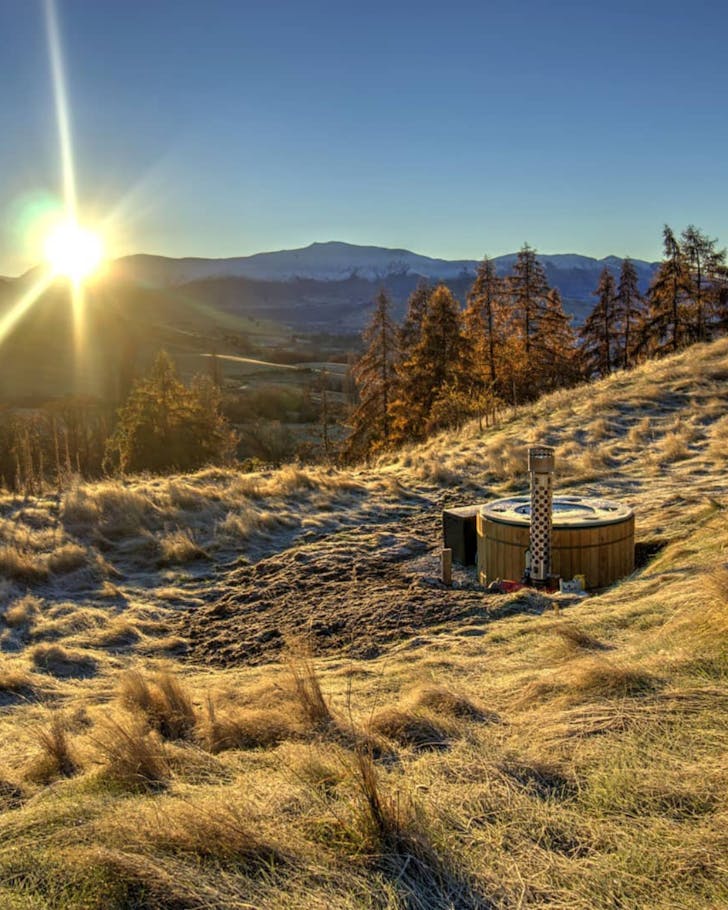 A hot tub perched on a hillside in Queenstown
