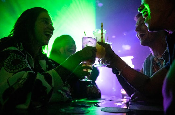 Friends cheers at Universal nightclub in Sydney