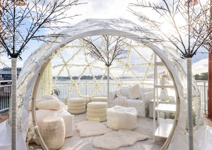 The pop-up igloo suite at Pier One hotel in Sydney, with Walsh Bay in the background. 
