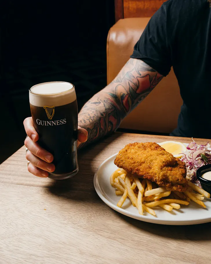 Minsky's chicken schnitzel and a pint of Guiness for their noughties pricing special