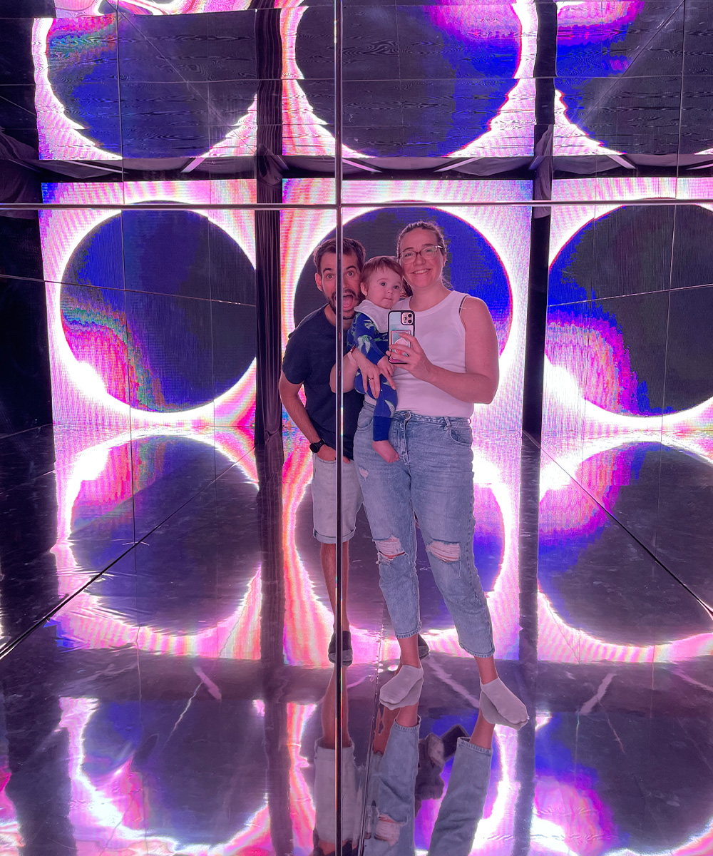 a family in an infinity room