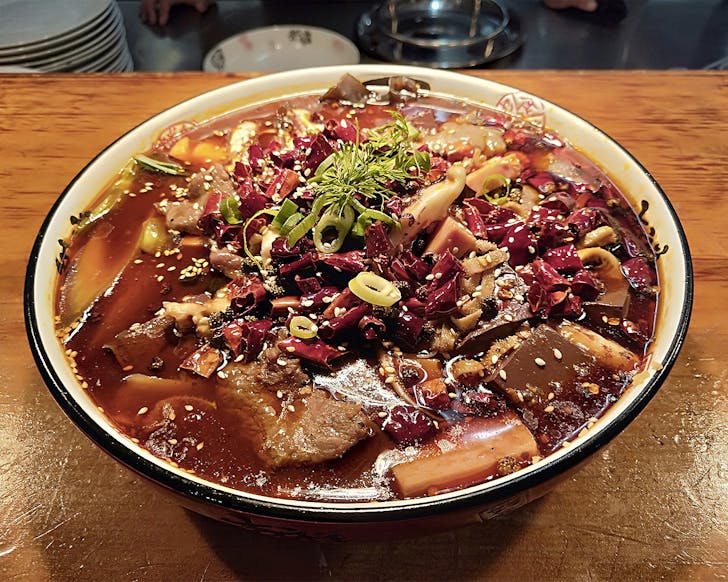 A heaping bowl of noodles and chillies at Impression Manor.