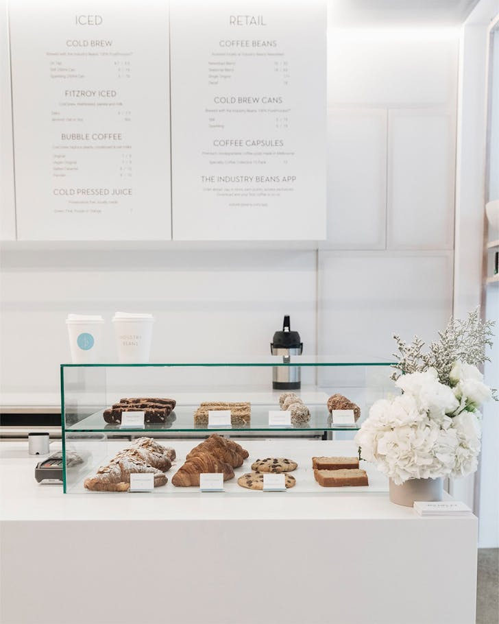 a brisbane coffee shop counter full of baked goods