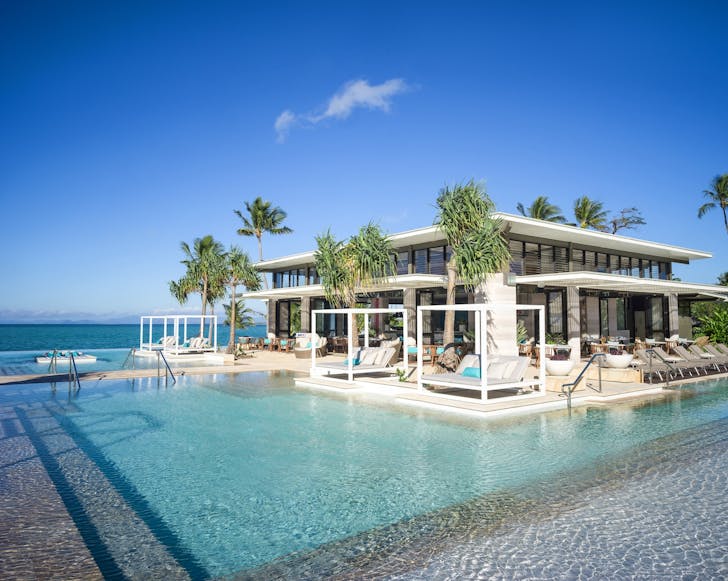 the infinity pool atbintercontinental hayman great barrier reef overlooking the ocean on a blue-sky day