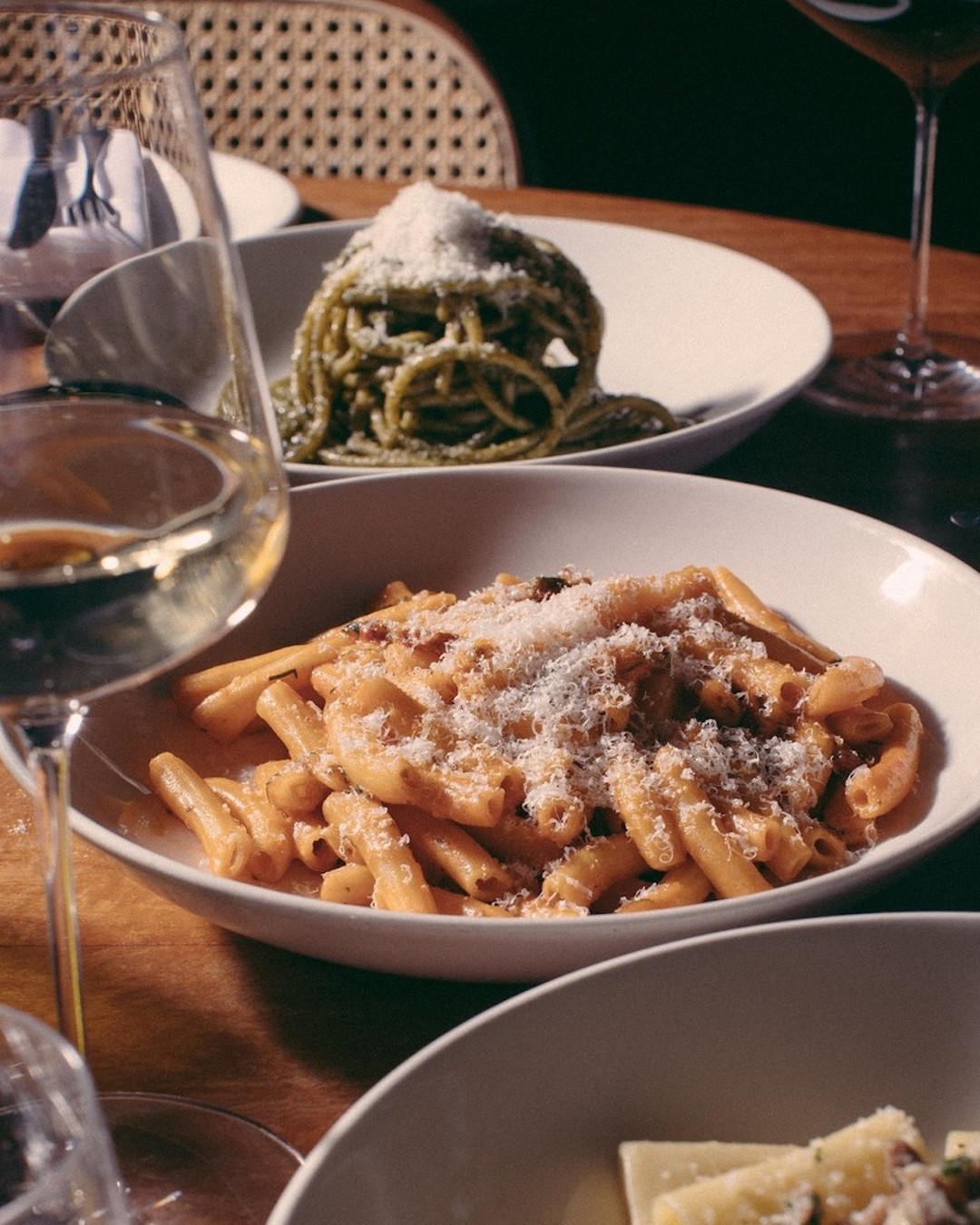 pasta dishes and wine at Italian restaurant, Post