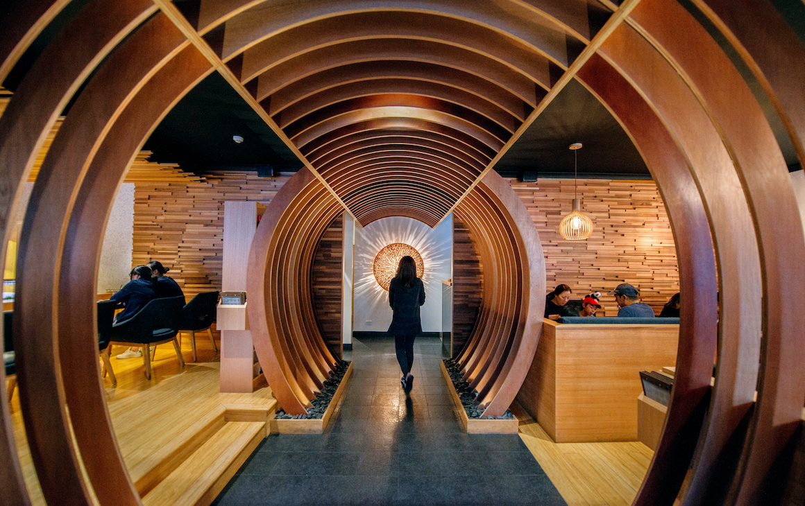 large timber arches in a Japanese restaurant